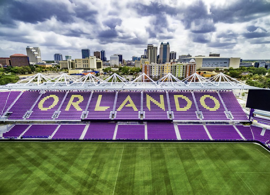 Orlando City Soccer Stadium with word Orlando spelled out in yellow seats