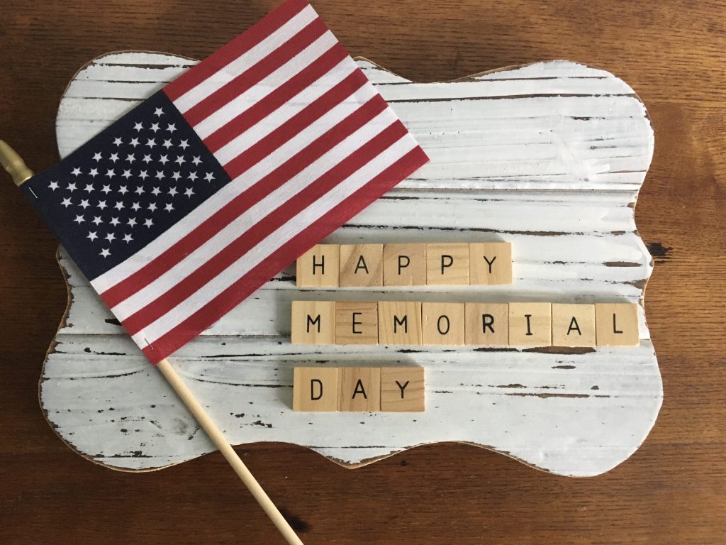 Memorial day sign and american flag